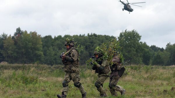 Militares da Ucrânia participando de exercícios militares com os EUA e outros países da OTAN perto de Lvov, Ucrânia, 24 de setembro de 2021 - Sputnik Brasil