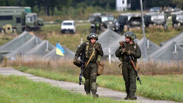 Soldados da Ucrânia durante exercícios militares conjuntos da Ucrânia e países da OTAN Rapid Trident 2020 - Sputnik Brasil
