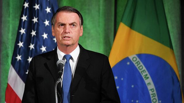 Presidente do Brasil, Jair Bolsonaro, discursa durante uma discussão sobre relações EUA-Brasil na Câmara do Comércio americana em Washington, 18 de março de 2019 - Sputnik Brasil