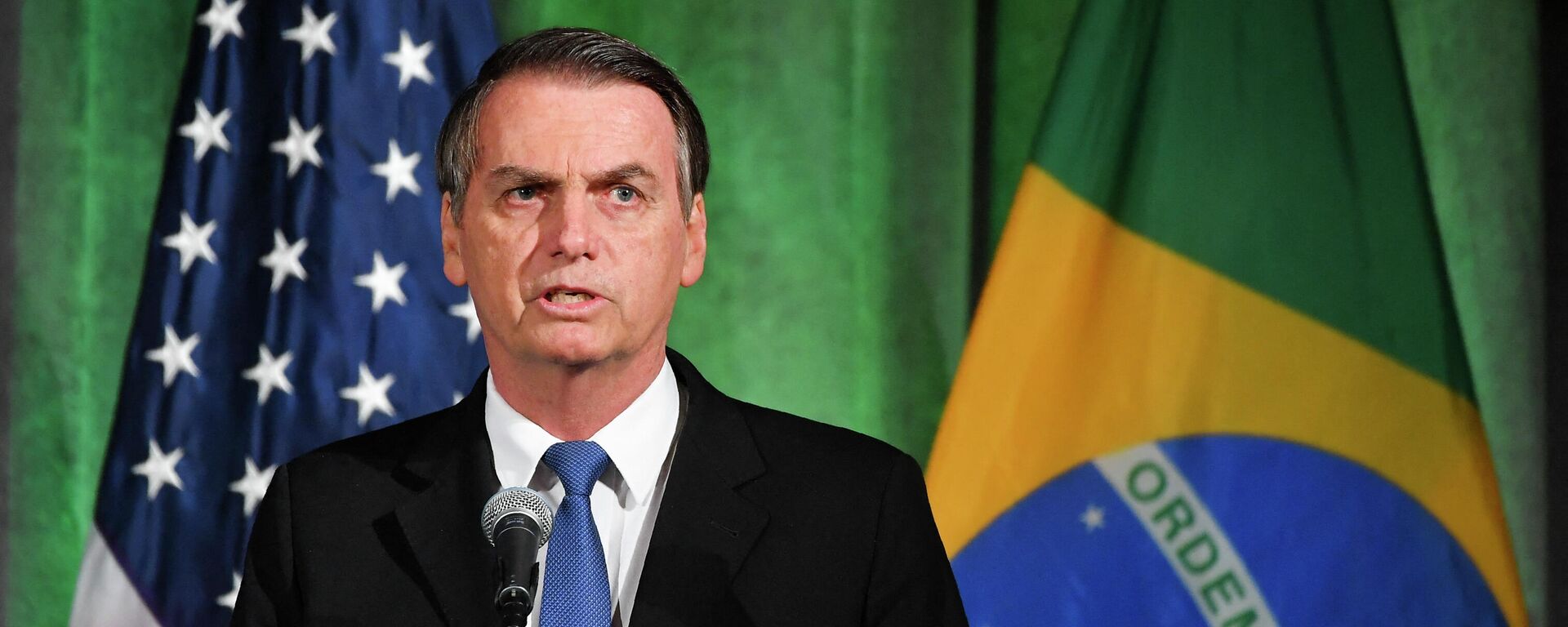 Presidente do Brasil, Jair Bolsonaro, discursa durante uma discussão sobre relações EUA-Brasil na Câmara do Comércio americana em Washington, 18 de março de 2019 - Sputnik Brasil, 1920, 02.02.2022