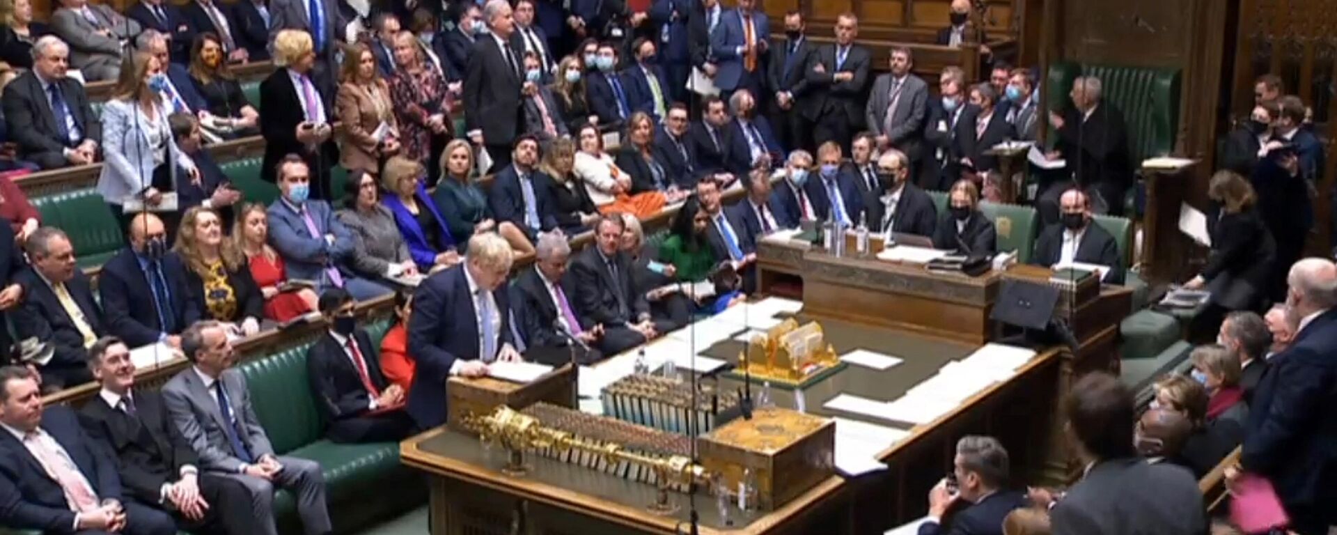 Uma captura de vídeo de imagens transmitidas pela Unidade de Gravação Parlamentar do Parlamento do Reino Unido (PRU) mostra o primeiro-ministro britânico, Boris Johnson, fazendo uma declaração aos parlamentares, na Câmara dos Comuns em Londres em 31 de janeiro de 2022 - Sputnik Brasil, 1920, 10.02.2022