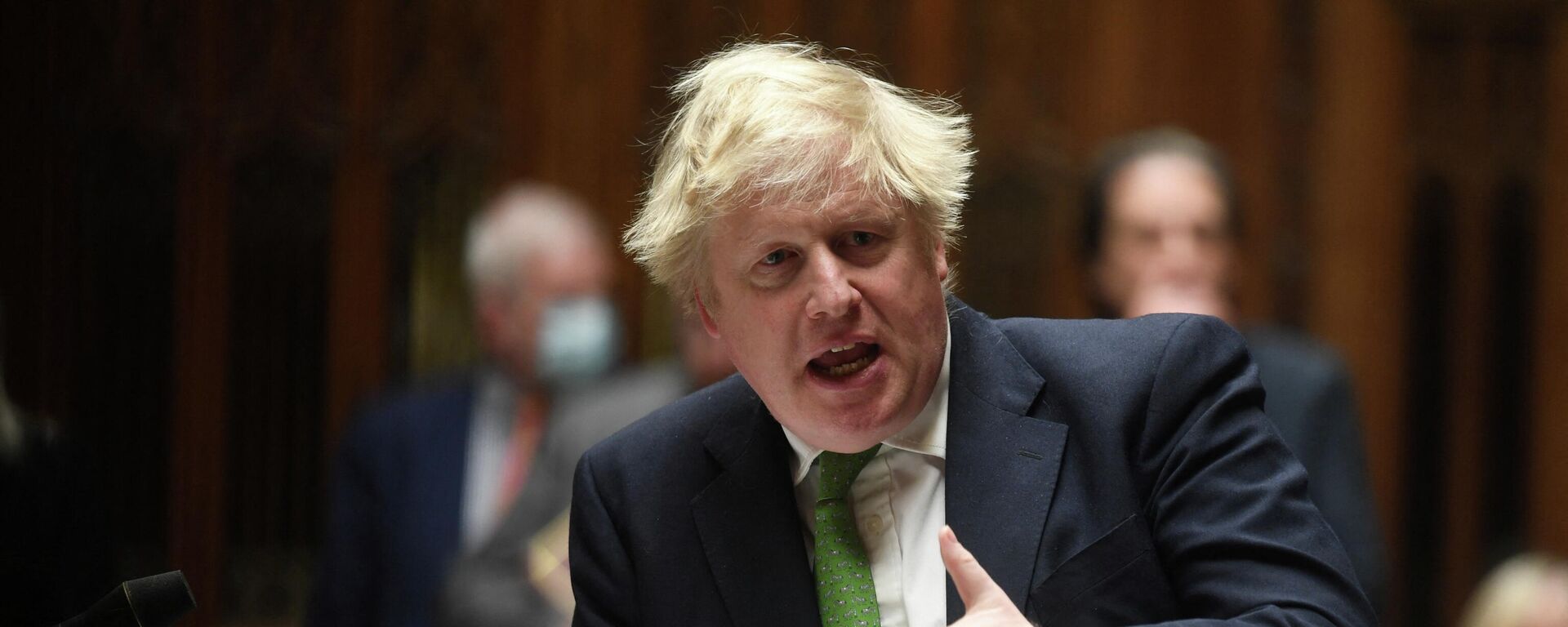 O primeiro-ministro britânico Boris Johnson faz uma declaração sobre a situação na Ucrânia, na Câmara dos Comuns, Londres, Reino Unido, 22 de fevereiro de 2022 - Sputnik Brasil, 1920, 23.02.2022