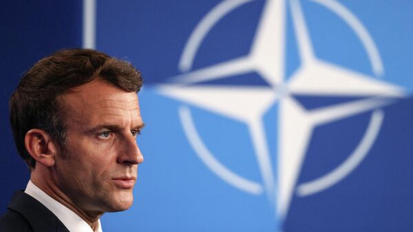Em Bruxelas, na Bélgica, o presidente francês, Emmanuel Macron, participa de coletiva de imprensa durante encontro da Organização do Tratado do Atlântico Norte (OTAN), em 14 de junho de 2021 - Sputnik Brasil
