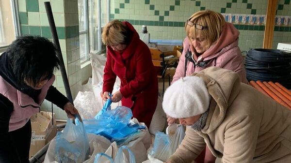 Ajuda humanitária russa chega à Carcóvia, na Ucrânia. - Sputnik Brasil
