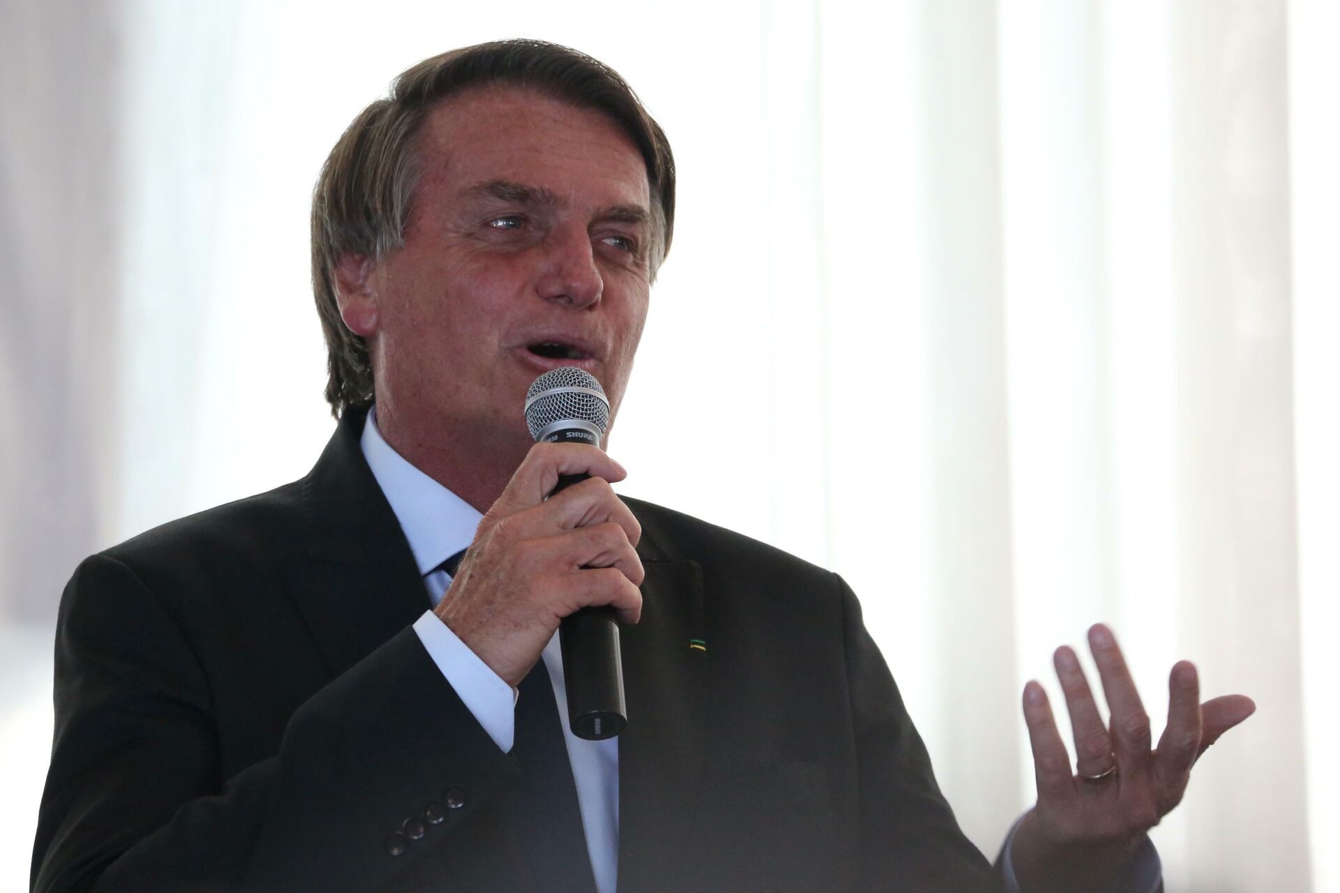 Presidente do Brasil, Jair Bolsonaro, fala durante reunião com líderes evangélicos no Palácio da Alvorada, 8 de março de 2022 - Sputnik Brasil, 1920, 09.03.2022