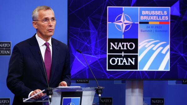 O secretário-geral da OTAN, Jens Stoltenberg, participa de uma coletiva de imprensa na véspera de uma cúpula da OTAN, em Bruxelas, Bélgica, em 23 de março de 2022 - Sputnik Brasil