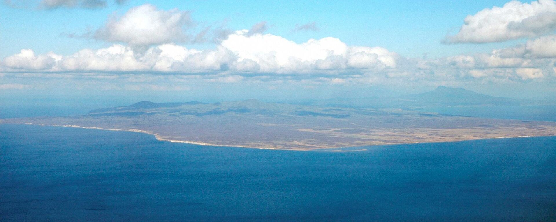 Vista área da ilha Kunashiri, pertencente às Ilhas Curilas, pertencentes à Rússia (imagem referencial) - Sputnik Brasil, 1920, 31.03.2022