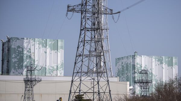 Prédios dos reatores 6 (à esquerda) e 5 (à direita) da usina nuclear de Fukushima em Okuma, prefeitura de Fukushima, Japão, 5 de março de 2022 - Sputnik Brasil