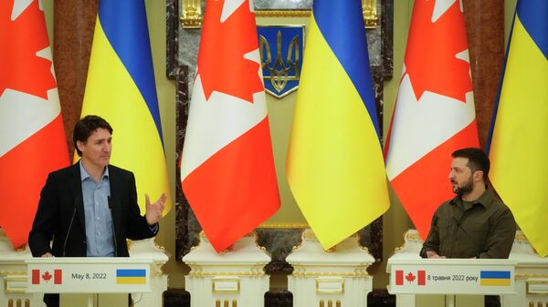 Primeiro-ministro canadense, Justin Trudeau, e presidente ucraniano, Vladimir Zelensky, em 8 de maio de 2022.  - Sputnik Brasil