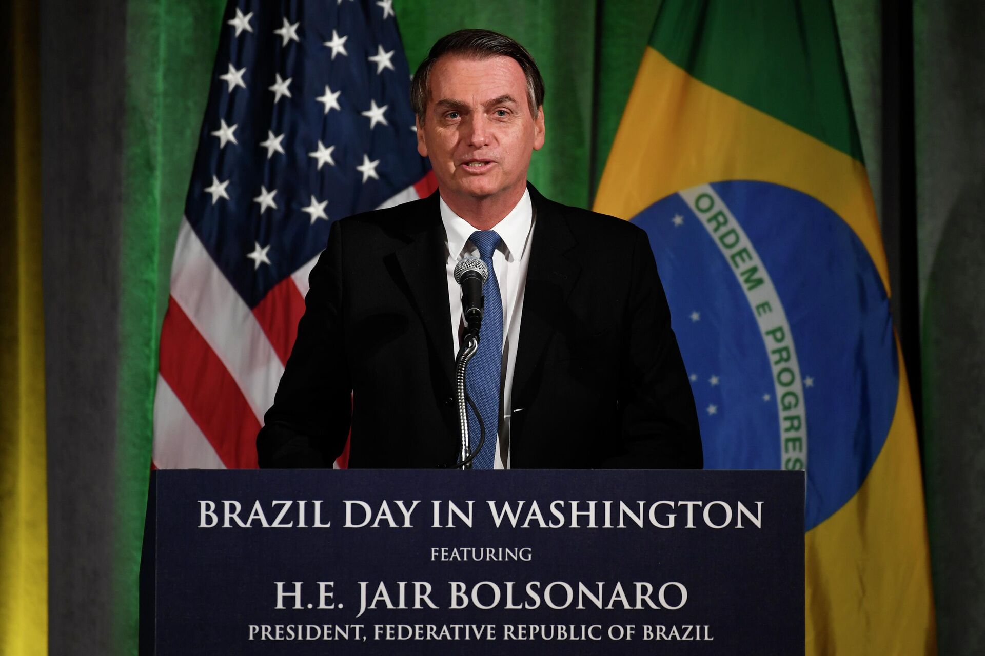 O presidente brasileiro, Jair Bolsonaro, discursa durante evento da Câmara de Comércio Brasil-Estados Unidos, em Washington, 18 de março de 2019 - Sputnik Brasil, 1920, 02.06.2022
