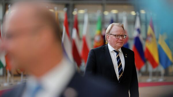 Ministro da Defesa da Suécia, Peter Hultqvist, durante reunião ministerial em Bruxelas, 21 de março de 2022 - Sputnik Brasil