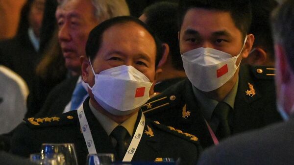 O ministro da Defesa da China, Wei Fenghe, participa da recepção de abertura na cúpula do Diálogo Shangri-La em Cingapura em 10 de junho de 2022 - Sputnik Brasil
