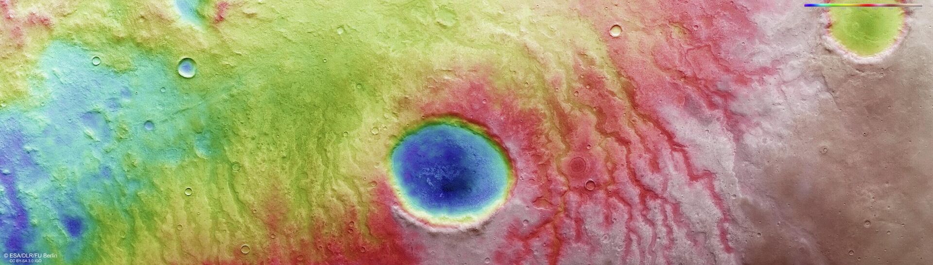 Esta imagem topográfica codificada por cores mostra parte da paisagem marcada que compõe Aonia Terra, uma região de planalto nas terras altas do sul de Marte. Foi criado a partir de dados recolhidos pela Mars Express da ESA, 25 de abril de 2022 - Sputnik Brasil, 1920, 13.06.2022