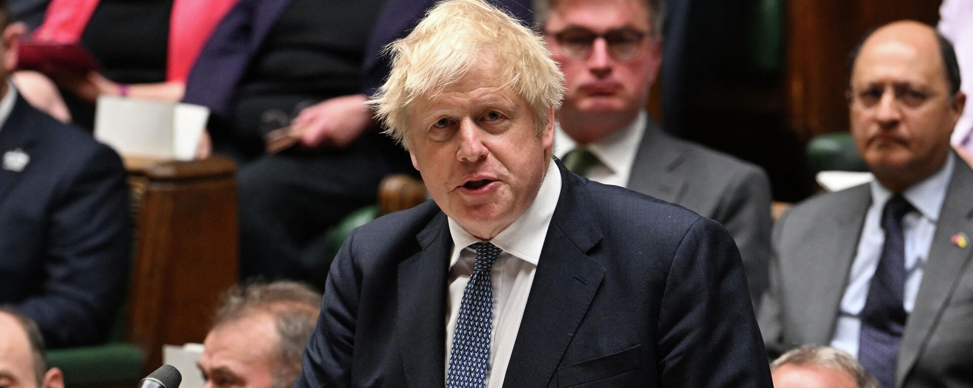 Primeiro-ministro britânico, Boris Johnson fala durante a sessão semanal das Questões do Primeiro-Ministro (PMQs, na sigla em inglês), na Câmara dos Comuns, em Londres, em 15 de junho de 2022 - Sputnik Brasil, 1920, 15.06.2022