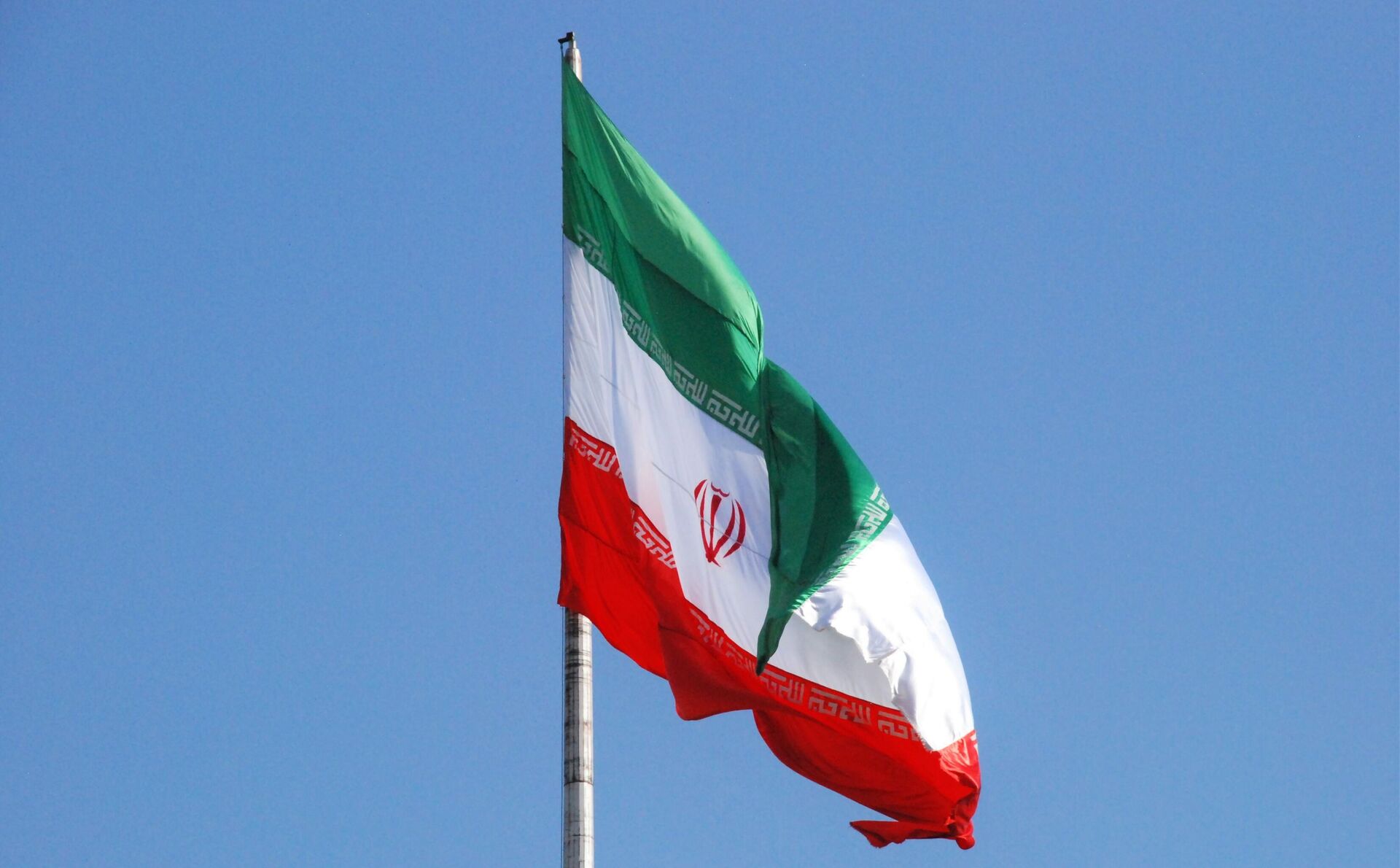 A bandeira do Irã em rua de Teerã, em 15 de junho de 2018 - Sputnik Brasil, 1920, 30.06.2022