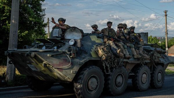 Soldados ucranianos montam um tanque, em uma estrada na região da República Popular de Donetsk (RPD), em 20 de julho de 2022 (foto de arquivo) - Sputnik Brasil