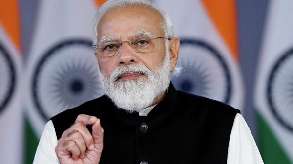 Primeiro-ministro indiano, Narendra Modi, abordando a Agenda Davos 2022 por meio de reunião virtual, em Nova Deli, na Índia, em 17 de janeiro de 2022 (foto divulgada pela assessoria de imprensa da Índia) - Sputnik Brasil
