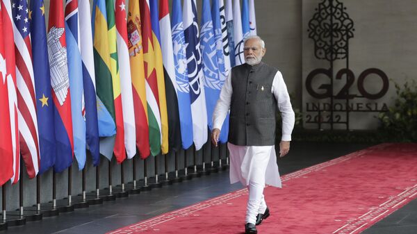 O primeiro-ministro indiano Narendra Modi chega à cúpula do G20 em Nusa Dua, Bali, Indonésia, 15 de novembro de 2022 - Sputnik Brasil