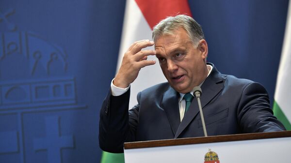 O primeiro-ministro húngaro, Viktor Orbán, fala durante uma coletiva de imprensa após esta reunião com o presidente russo, Vladimir Putin, na residência do primeiro-ministro em Budapeste, Hungria - Sputnik Brasil
