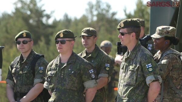 Soldados finlandeses durante exercício militar Saber Strike 2015 - Sputnik Brasil