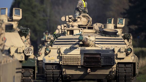 Tropas dos EUA em tanque norte-americano Abrams na Lituânia  - Sputnik Brasil