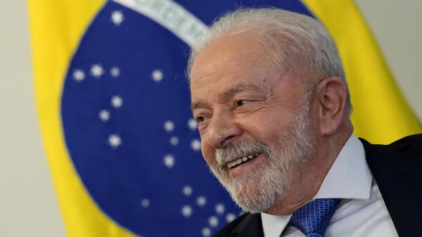 O presidente do Brasil, Luiz Inácio Lula da Silva, sorri durante uma reunião com membros do Congresso no Palácio do Planalto, o gabinete do presidente, em Brasília, Brasil, 11 de janeiro de 2023 - Sputnik Brasil