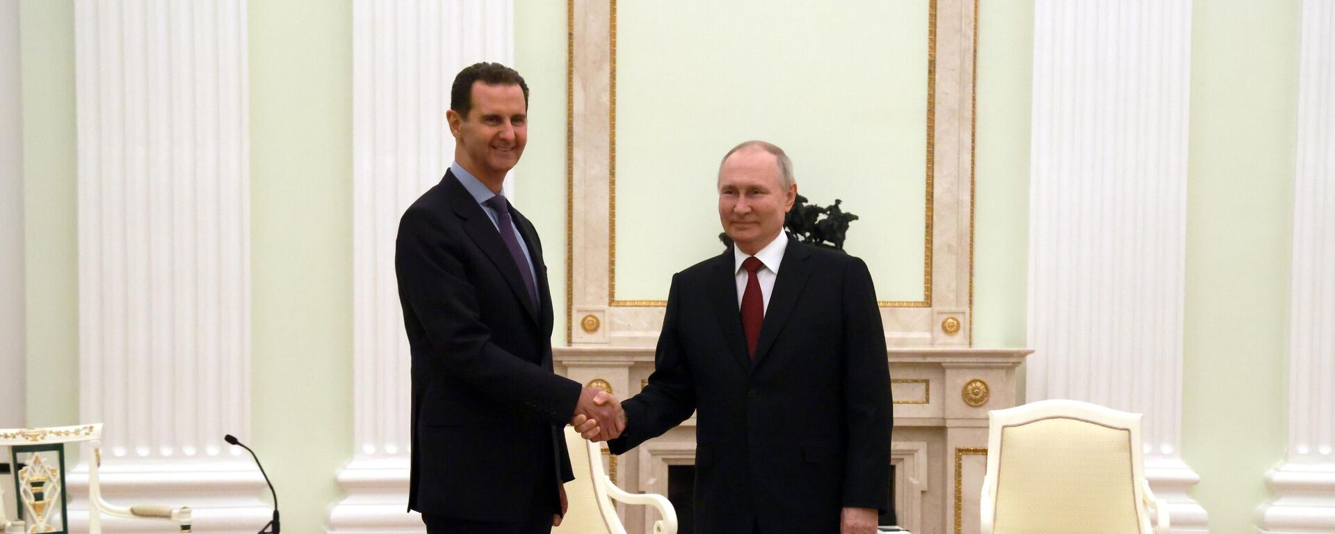 Vladimir Putin, o presidente russo, em seu encontro nesta quarta-feira (15) com Bashar al-Assad, o presidente sírio - Sputnik Brasil, 1920, 15.03.2023