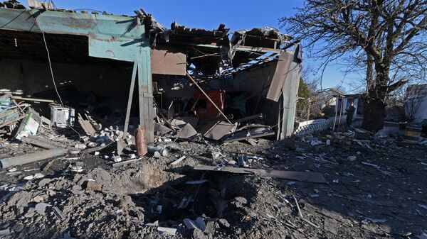 Prédio destruído após disparos das Forças Armadas da Ucrânia em Volnovokha, na República Popular de Donetsk, foto publicada em 13 de março de 2023 - Sputnik Brasil