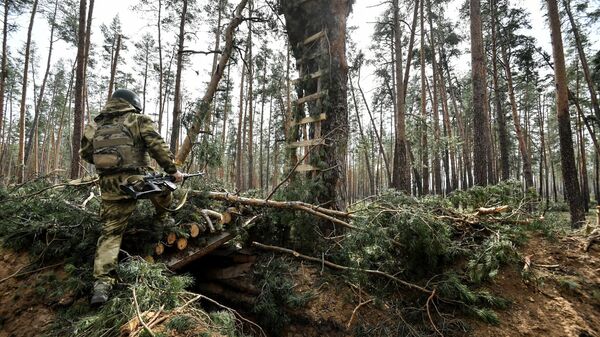 Combatente das forças especiais Akhmat no front de Kremennaya, Donbass, foto publicada em 5 de abril de 2023 - Sputnik Brasil