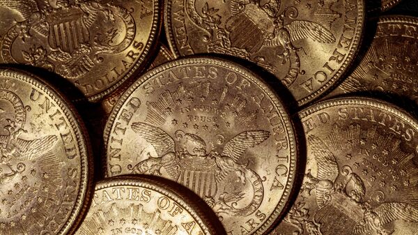 Moedas de ouro de 20 dólares americanos são retratadas em Paris - Sputnik Brasil