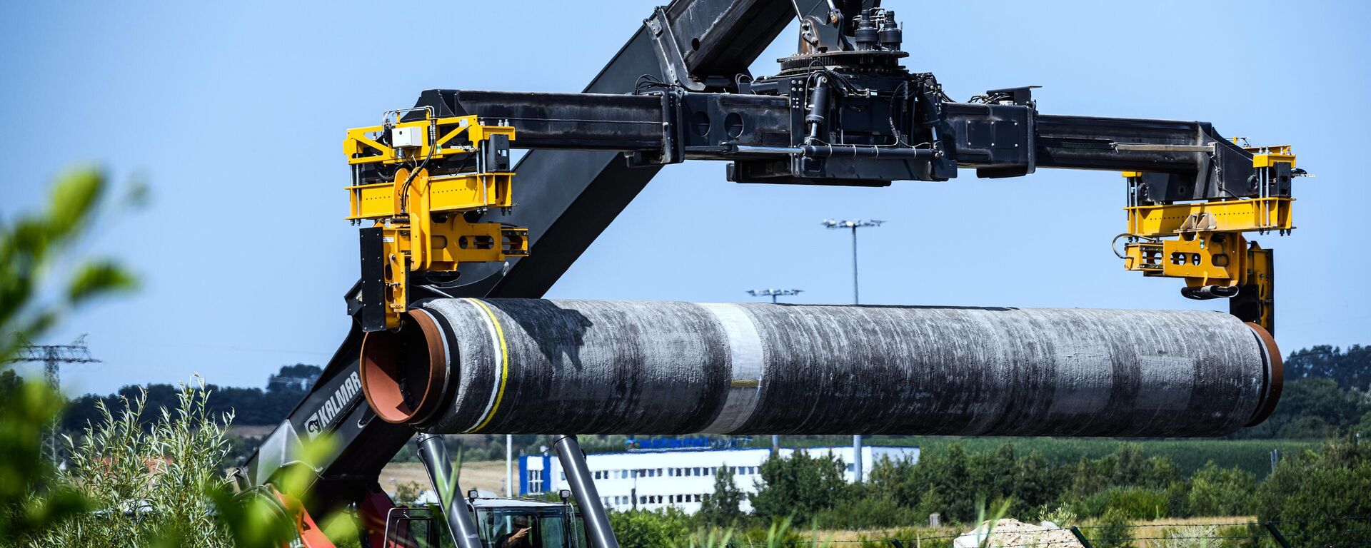 Centro de logística do Nord Stream 2 (Corrente do Norte 2), onde são armazenados tubos para o gasoduto, no porto de Mukran, ilha de Rugen, Alemanha, foto publicada em 23 de julho de 2021 - Sputnik Brasil, 1920, 18.02.2024