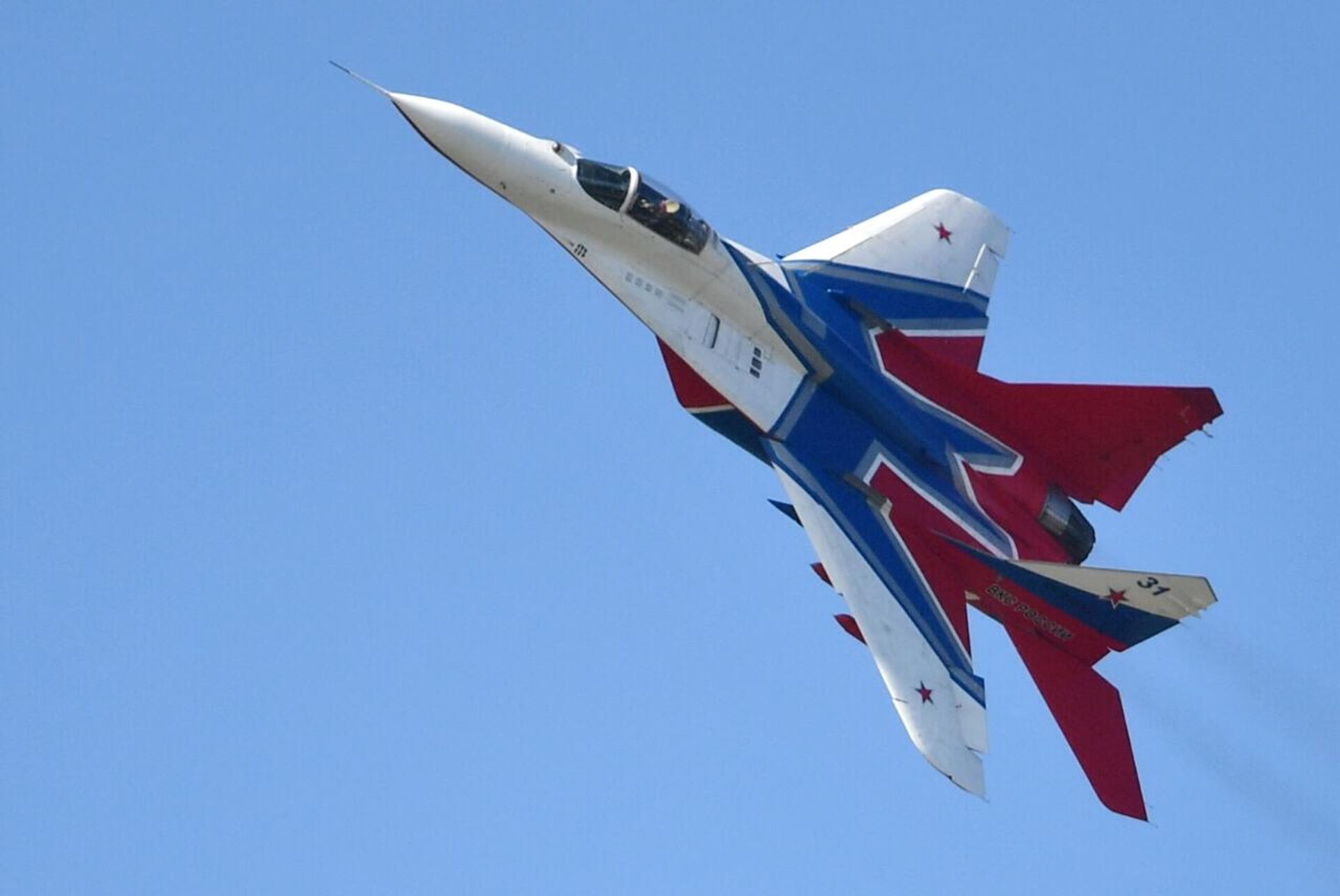 Aeronave MiG-29 da equipe de acrobacia aérea Strizhi realiza um voo no Show Aéreo e Espacial Internacional de Aviação MAKS 2019 em Zhukovsky, região de Moscou. - Sputnik Brasil, 1920, 22.05.2023