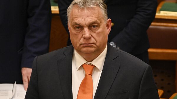 O primeiro-ministro da Hungria, Viktor Orbán, após uma votação sobre a candidatura da Finlândia para ingressar na OTAN, no parlamento em Budapeste, Hungria, em 27 de março de 2023 - Sputnik Brasil