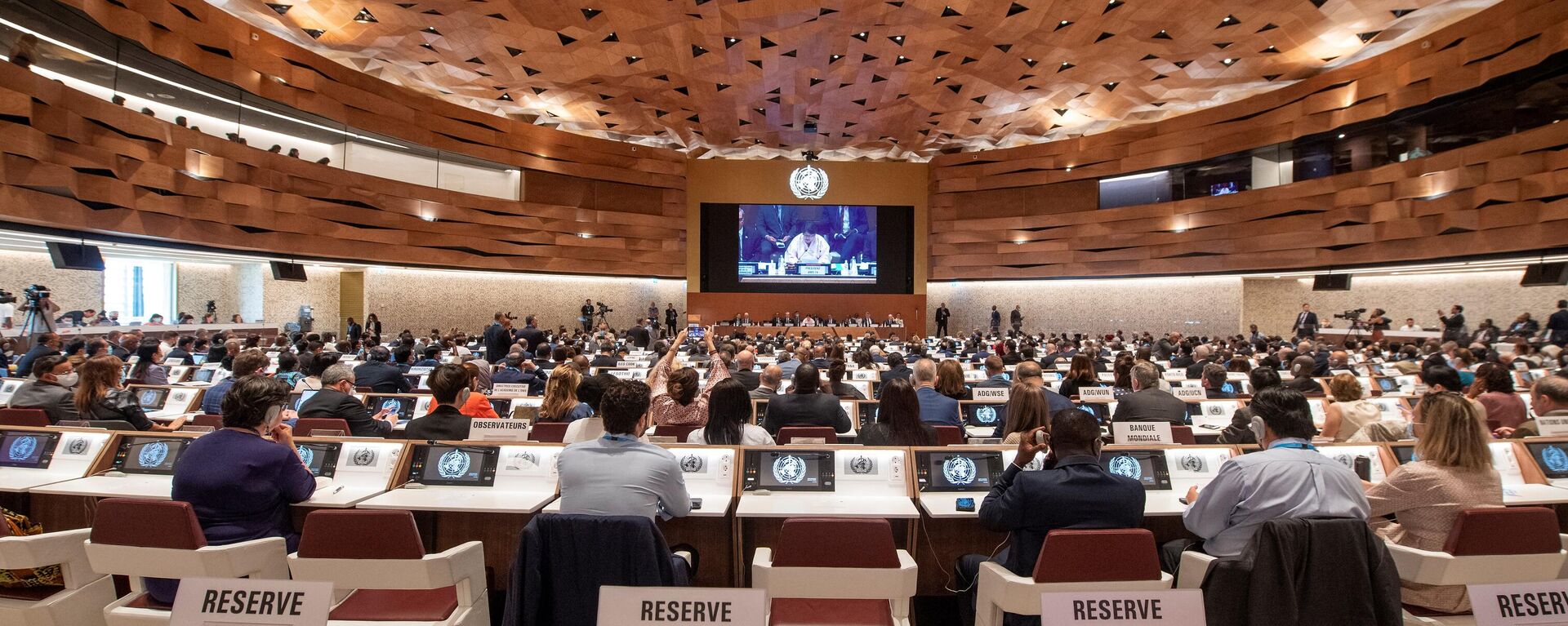 Delegados se reúnem no dia de abertura da 75ª Assembleia Mundial da Saúde da Organização Mundial da Saúde (OMS) em Genebra, em 22 de maio de 2022 - Sputnik Brasil, 1920, 24.05.2023