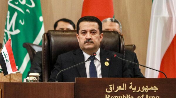 O primeiro-ministro iraquiano, Mohamed Shia al-Sudani, participa da Conferência de Bagdá para Cooperação e Parceria em Sweimeh, na costa do Mar Morto, no centro-oeste da Jordânia, em 20 de dezembro de 2022 - Sputnik Brasil