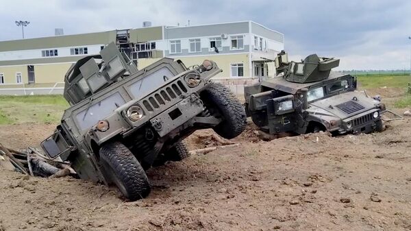 Equipamento militar destruído usado pelas tropas ucranianas em seu malfadado ataque à região russa de Belgorod - Sputnik Brasil