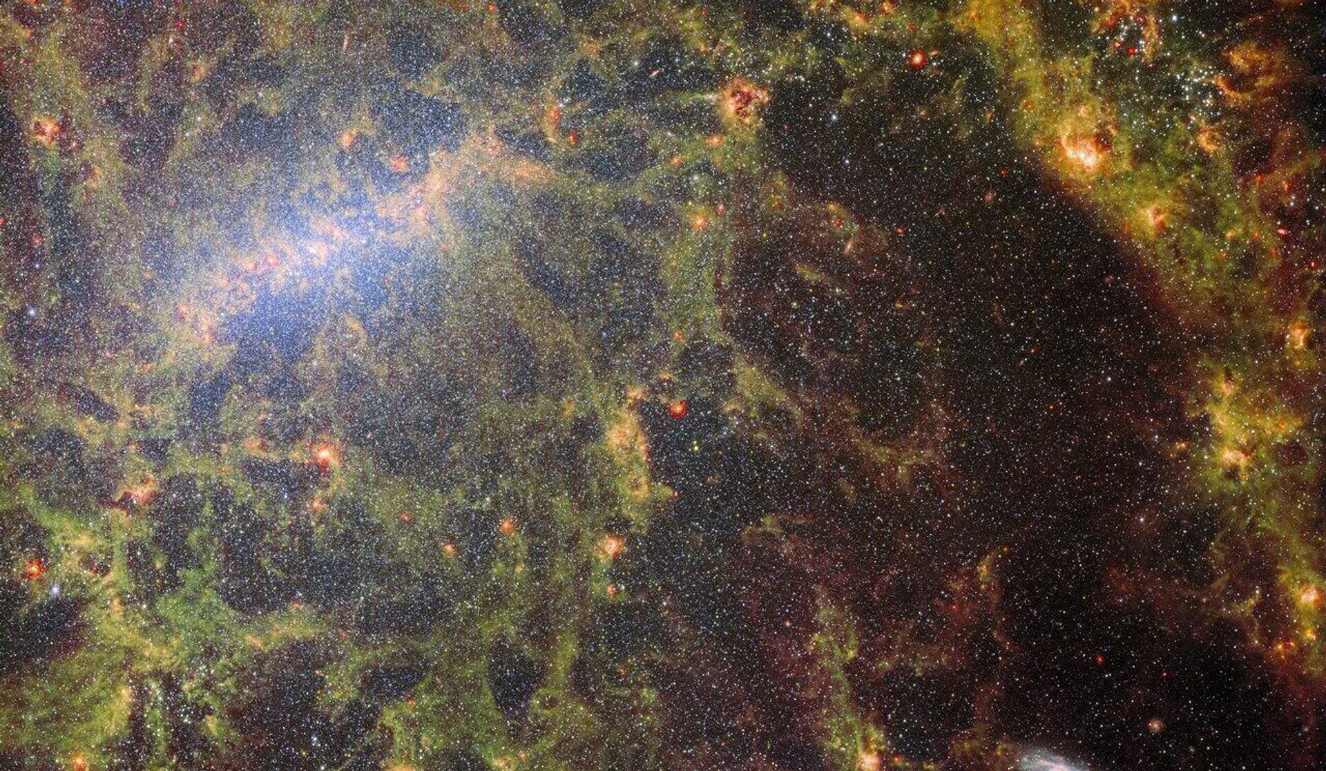 A NASA divulgou novas imagens captadas pelo Telescópio Espacial James Webb da galáxia espiral NGC 5068, localizada a aproximadamente 20 milhões de anos-luz da Terra - Sputnik Brasil, 1920, 04.06.2023