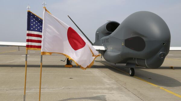 Drone de rastreamento Global Hawk no seu hangar na Base Aérea de Misawa, Japão, 30 de maio de 2014 - Sputnik Brasil
