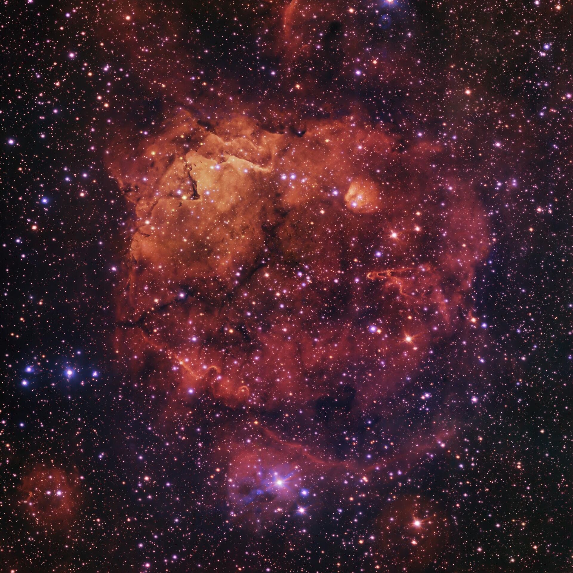 A Sh2-284, que lembra o rosto de um gato sorridente, é uma vasta região de poeira e gás, onde a parte mais brilhante tem aproximadamente 150 anos-luz de diâmetro - Sputnik Brasil, 1920, 28.06.2023