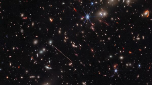 Imagem do Telescópio James Webb revela o aglomerado de galáxias El Gordo, com centenas de galáxias, algumas delas nunca vistas com este nível de detalhes - Sputnik Brasil