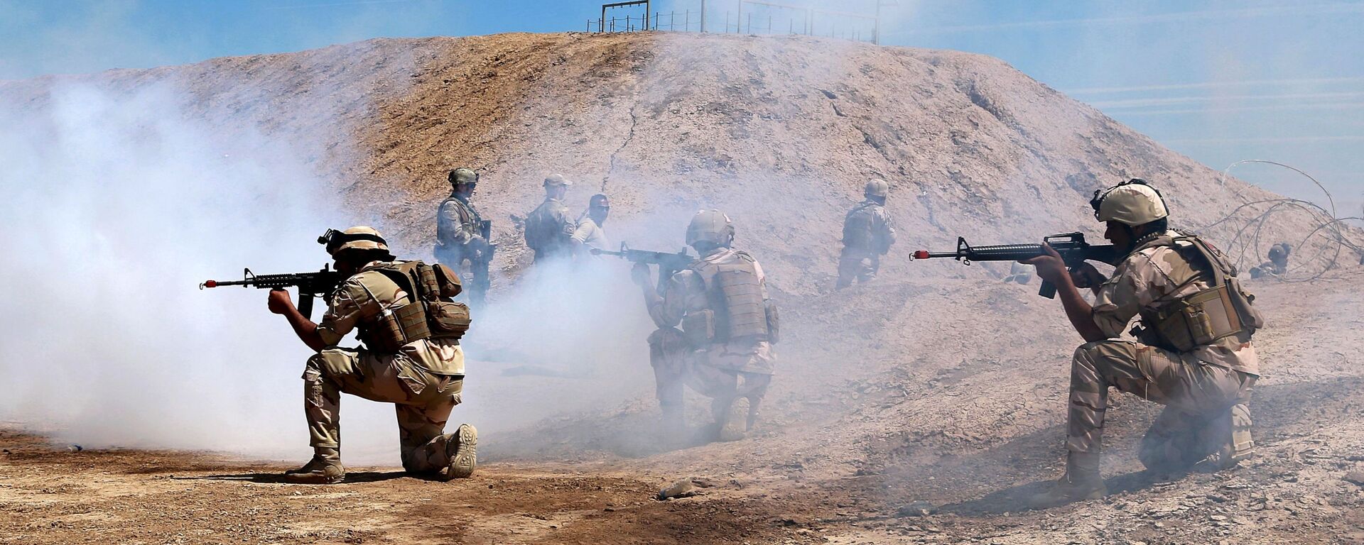 As forças da coalizão australiana e neozelandesa participam de uma missão de treinamento com soldados do Exército iraquiano na Base Taji, ao norte de Bagdá, Iraque, 17 de abril de 2019 - Sputnik Brasil, 1920, 06.08.2023