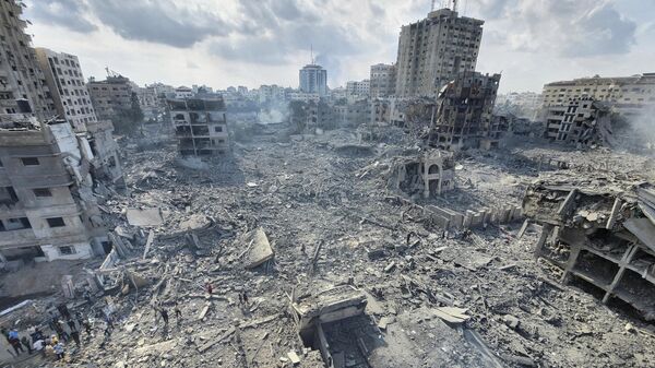 Bairro fica completamente destruído após ataque aéreo de Israel. Faixa de Gaza, 10 de outubro de 2023 - Sputnik Brasil