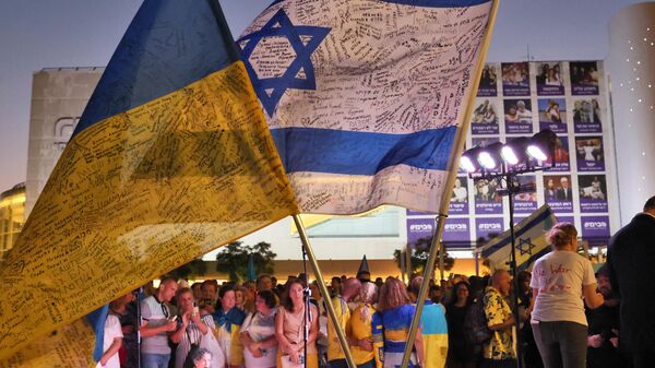 Pessoas se reúnem na cidade israelense de Tel Aviv para marcar o Dia da Independência da Ucrânia (da União Soviética em 1991), em 24 de agosto de 2022 - Sputnik Brasil