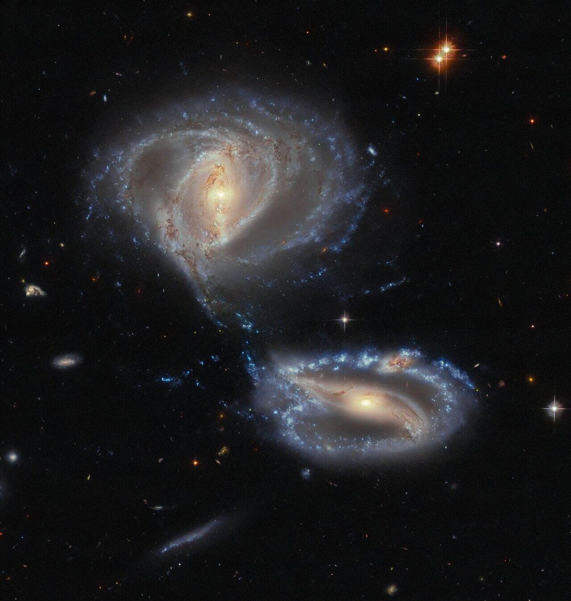 O Telescópio Espacial Hubble registrou um par de galáxias conhecido como Arp-Madore 2339-661 - Sputnik Brasil, 1920, 23.10.2023