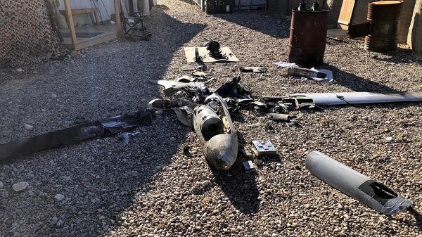 Partes dos destroços de um drone no chão perto da base aérea dos EUA de Ain al-Asad, na província de Anbar, Iraque, 4 de janeiro de 2022 - Sputnik Brasil