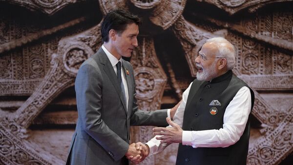Ministro Narendra Modi dá as boas-vindas ao primeiro ministro do Canadá, Justin Trudeau, no G20, 9 de setembro de 2023 - Sputnik Brasil
