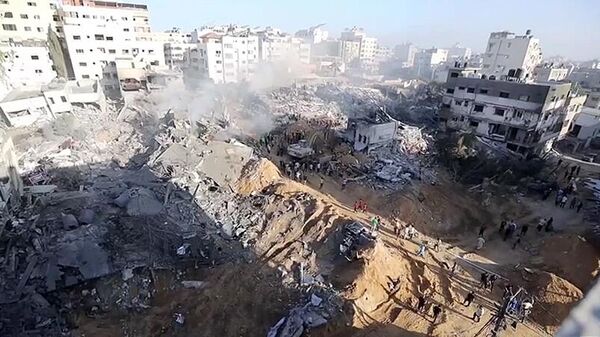 Consequências dos ataques israelenses em áreas residenciais em Gaza.  - Sputnik Brasil