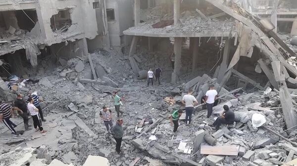 Escombros de edifício residencial em Gaza após ataque israelense - Sputnik Brasil