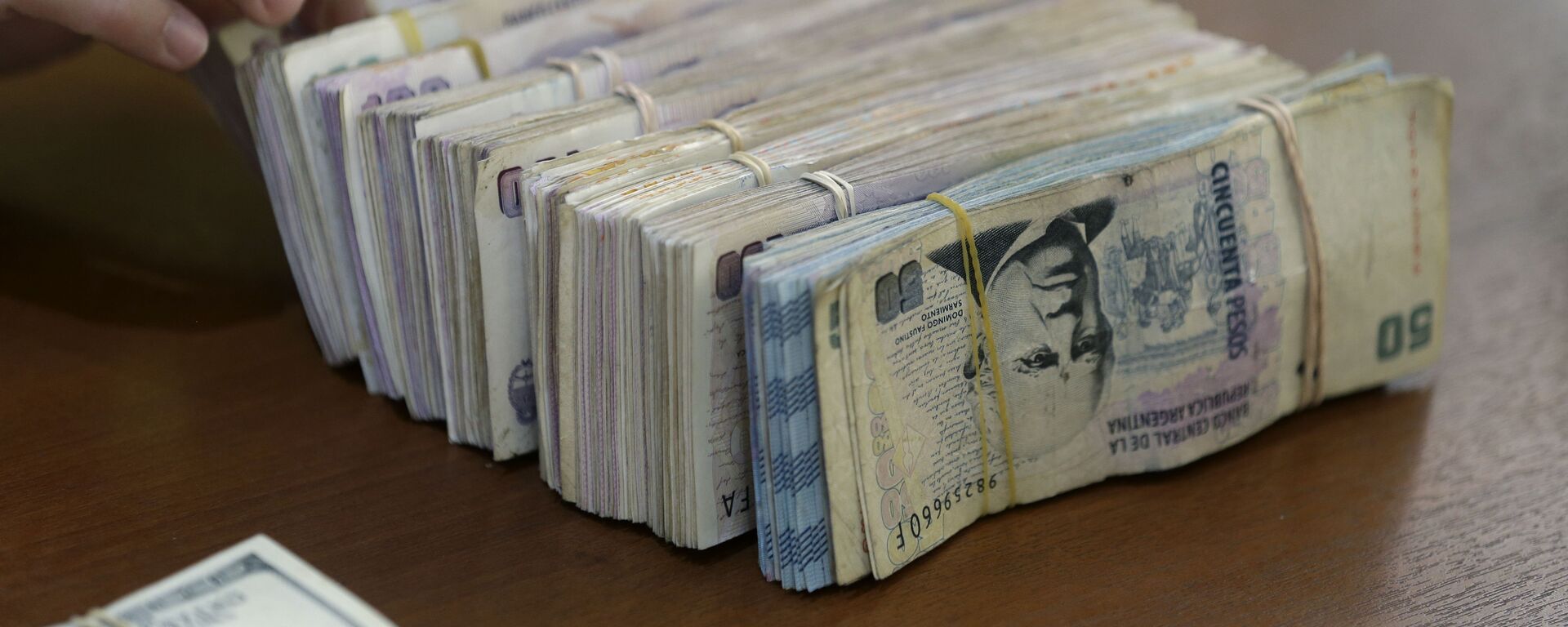 Pesos argentinos, Buenos Aires, Argentina, 17 de dezembro de 2015 - Sputnik Brasil, 1920, 21.11.2023