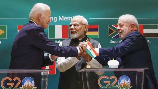 O presidente dos EUA, Joe Biden, o primeiro-ministro da Índia, Narendra Modi,  e o presidente do Brasil, Luiz Inácio Lula da Silva, durante a Cúpula do G20. Nova Deli, 9 de setembro de 2023 - Sputnik Brasil